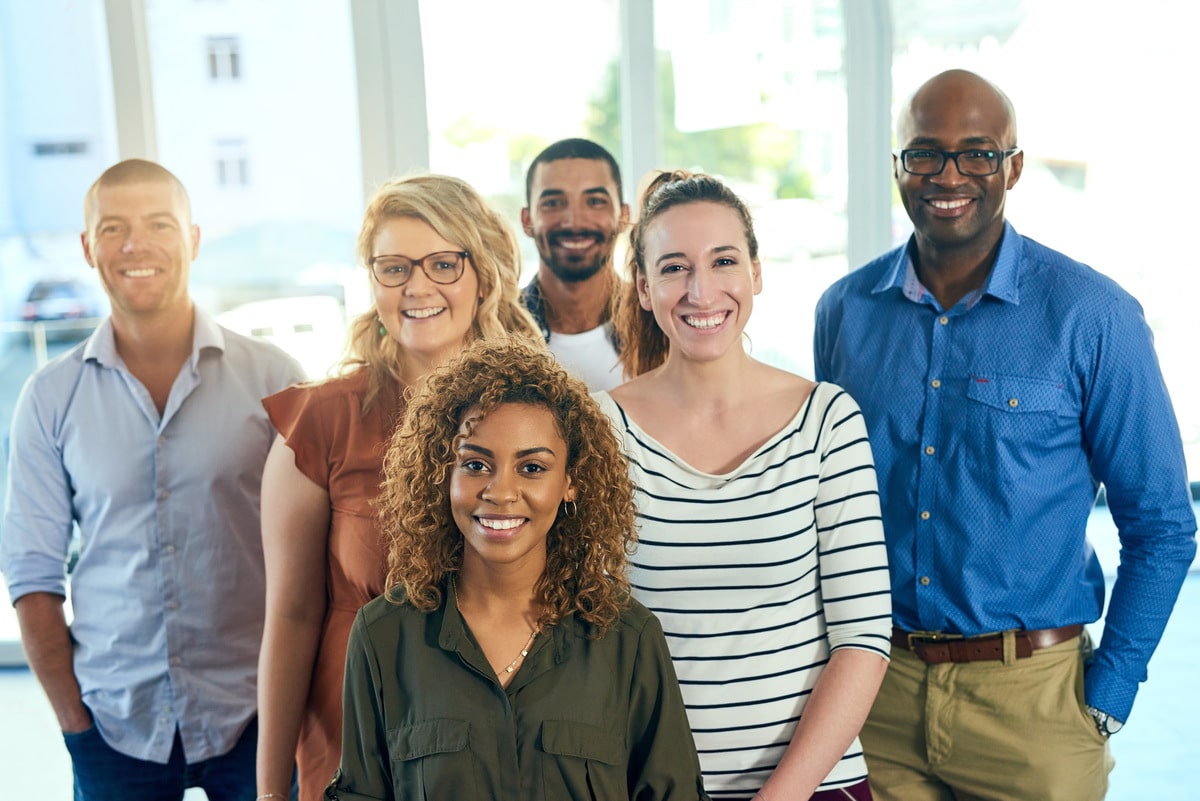 shot-of-a-group-cheerful-friends-posing-for-a-port-2023-11-27-05-18-21-utc (1)-min